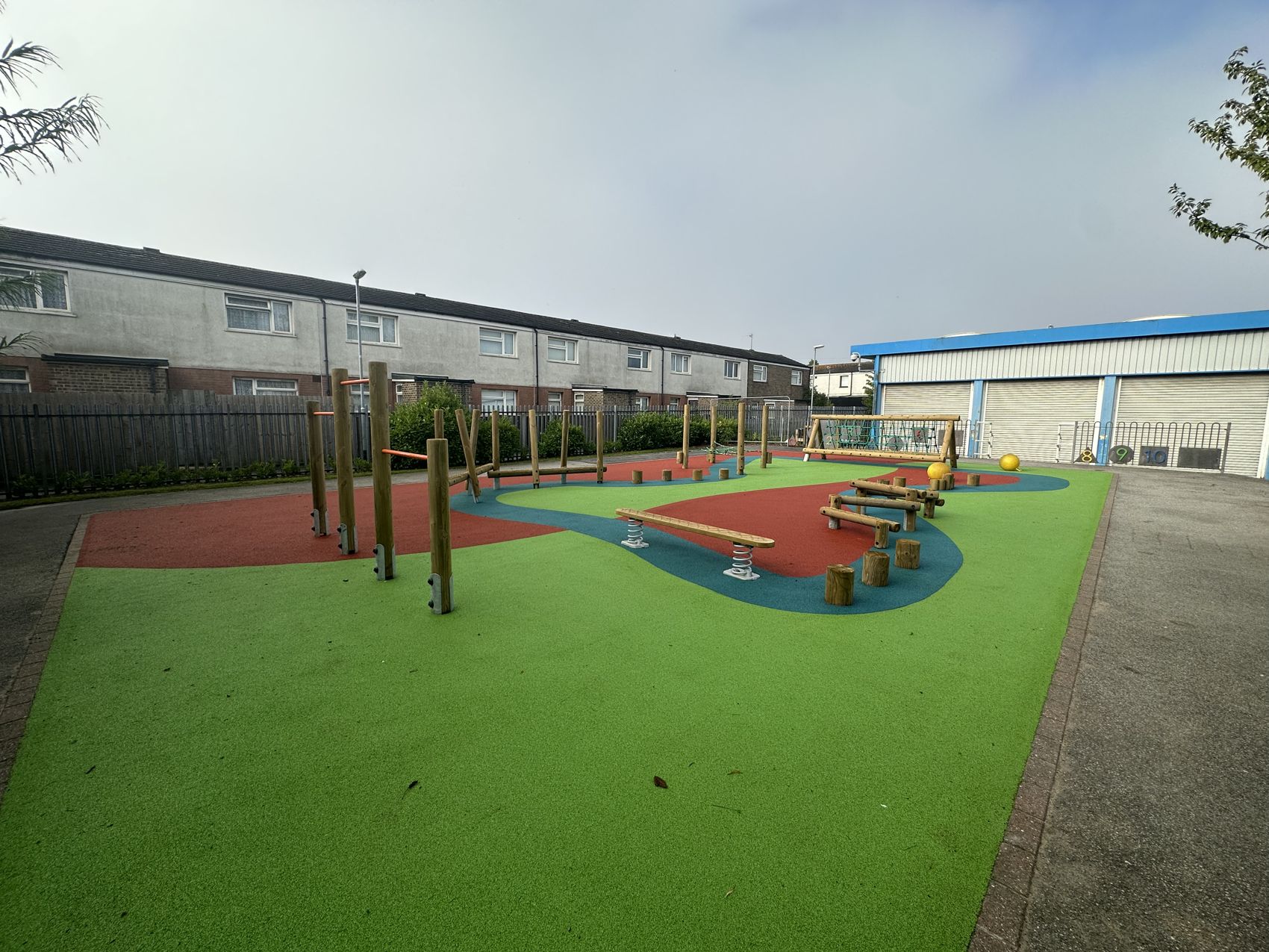 Rubber wetpour with timber trim trail